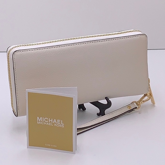 MICHAEL KORS LARGE TRAVEL CONTINENTAL WRISTLET WALLET OPTIC WHITE COLOR - Picture 11 of 16